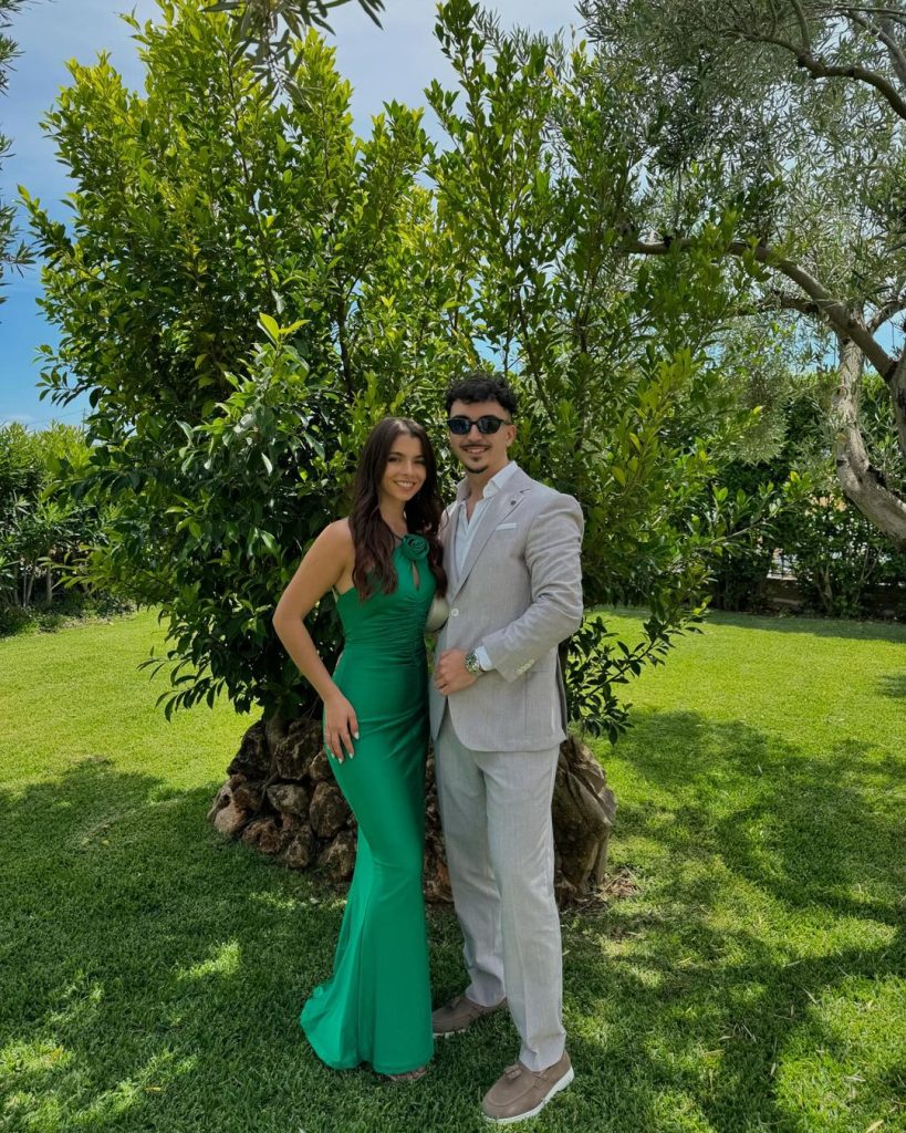 Henrique Mota with his girlfriend at a wedding